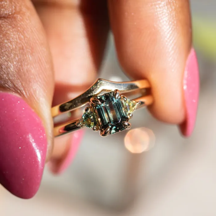 Anueva Jewelry Rings 156ct Emerald Cut Tanzanian Sapphire and Parti Sapphire Shield Three Stone Ring in 14k Yellow Gold